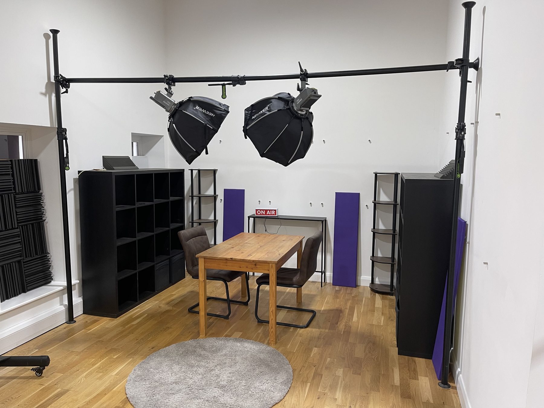 Studio Two podcast suite with acoustic panels, softboxes and an On Air sign